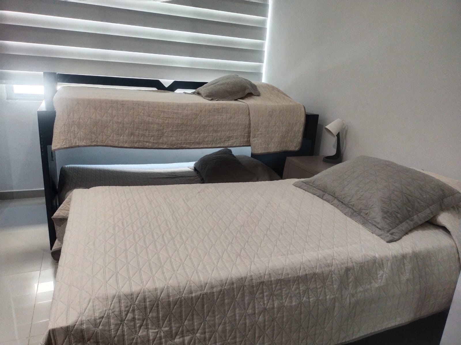 Habitación con dos camas del apartamento en Cartagena