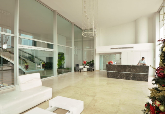Lobby de recepción en mármol del edificio